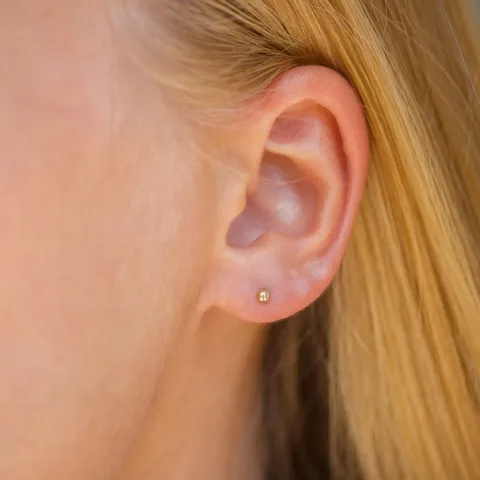 2,5 mm kugle helix piercing i 9 karat guld